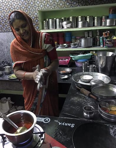 Durga Sharma making a delicious bread out of millet.