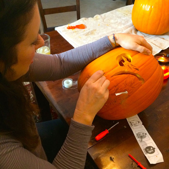 Kim carves her first pumpkin